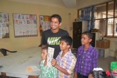 311 - Indian Tennis star Sanam Singh interacting with playroom kids